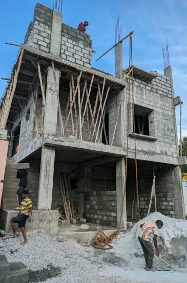 Residential building construction at the Krishnamurthy residence in Makali, Bangalore, showing the concrete structure before the project was completed.