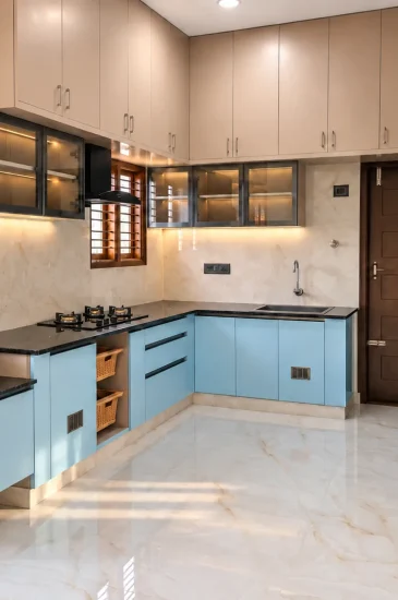 Modular kitchen interior design at the Krishnamurthy residence in Makali, Bangalore, with light blue lower cabinets, white upper cabinets and dark countertops.