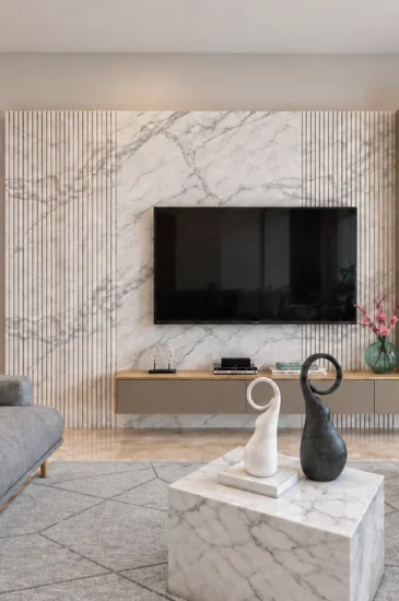 Living room TV wall design for the Manjunanth project, with a wall-mounted television, light-coloured feature wall and sofas on both sides