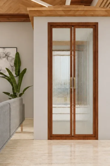 Open-plan living room and kitchen interior design for the Manjunanth project, showing a sofa, wood-framed glass door and breakfast counter